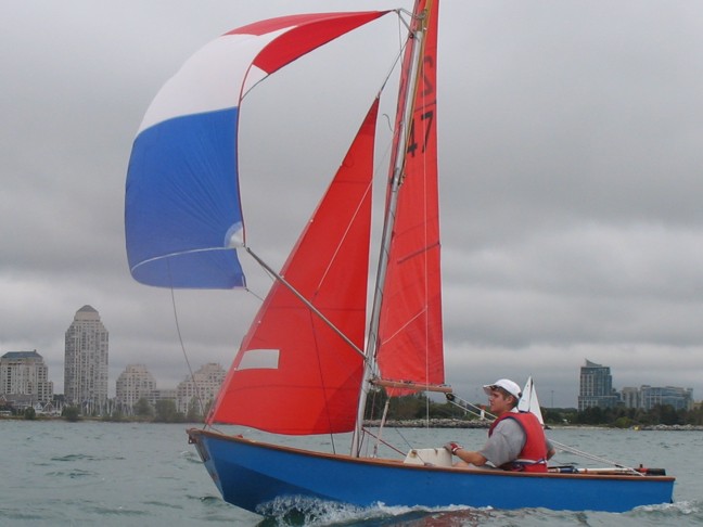Photo: Mat is First Across the Finish Line with Spinnaker Flying in the Last Race