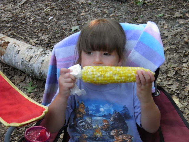 Photo: Taya Tackles a Cob of Corn
