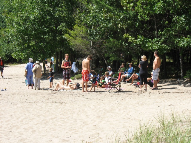 Photo: Gathering on the Beach to Watch the Fun
