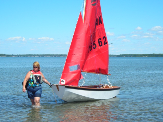 Photo: Heather Pulls Her Boat Ashore