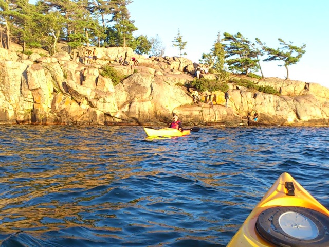 Photo: Kayaking by the Diving Rocks