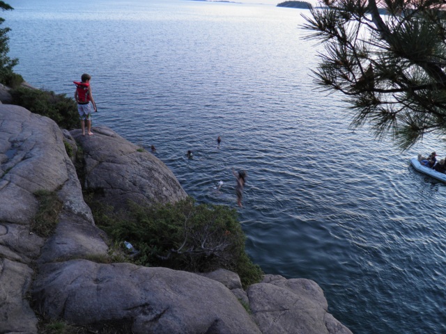 Photo: The Kids are More Interested in the Diving Rocks