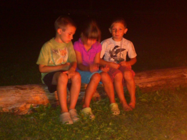 Photo: Kayden, Tayja and Wyatt at the Campfire